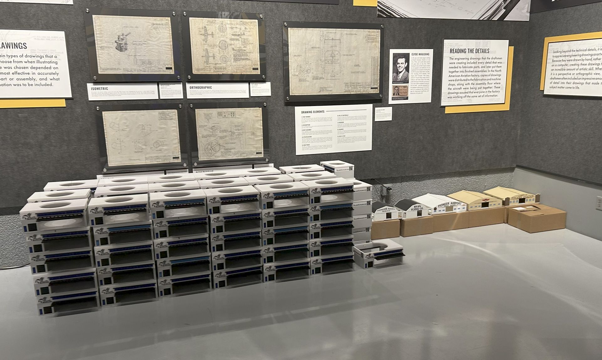 Pioneer Airport hangar models packaged for a museum exhibit