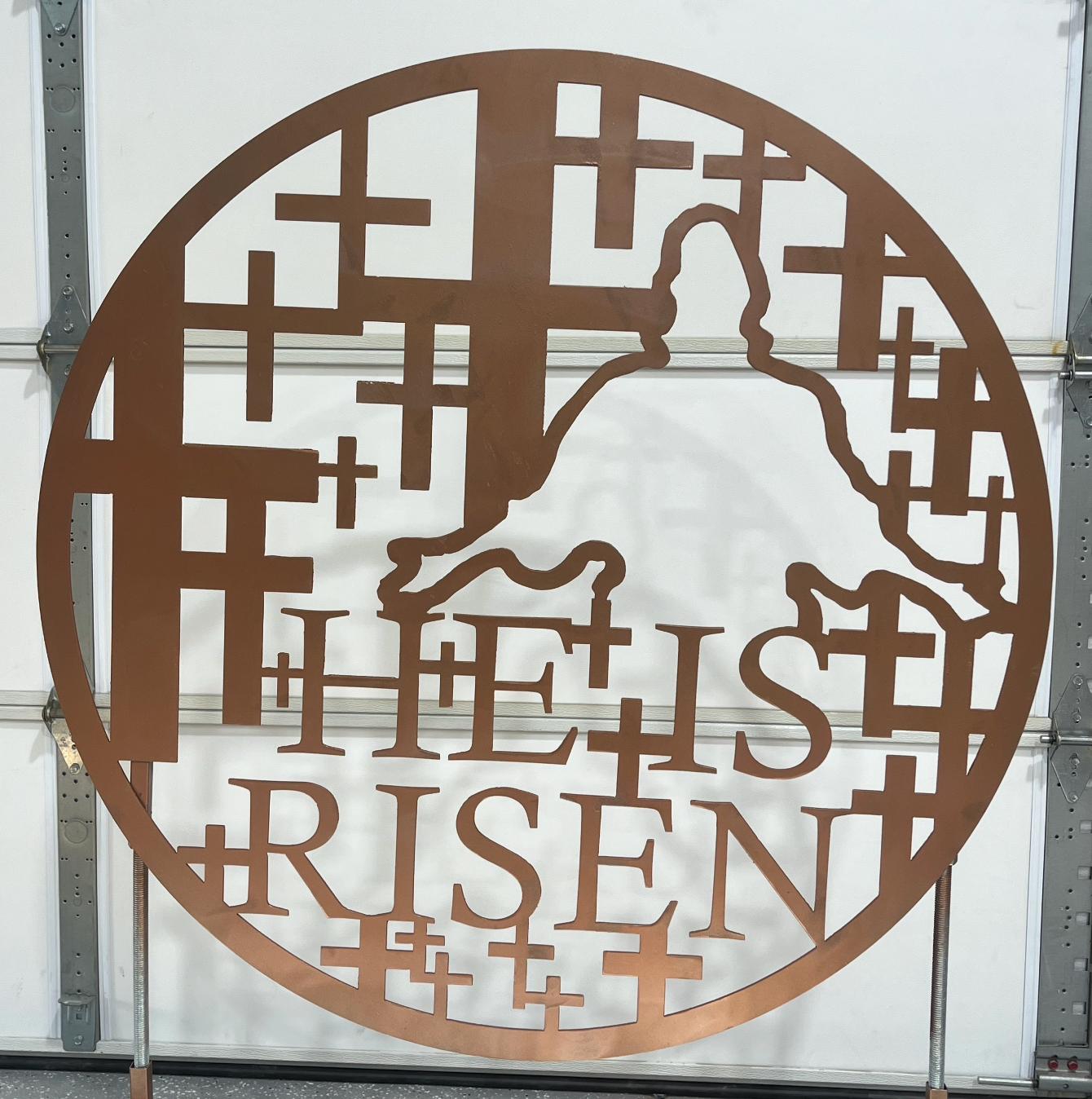 He Is Risen circular cross-pattern metal art