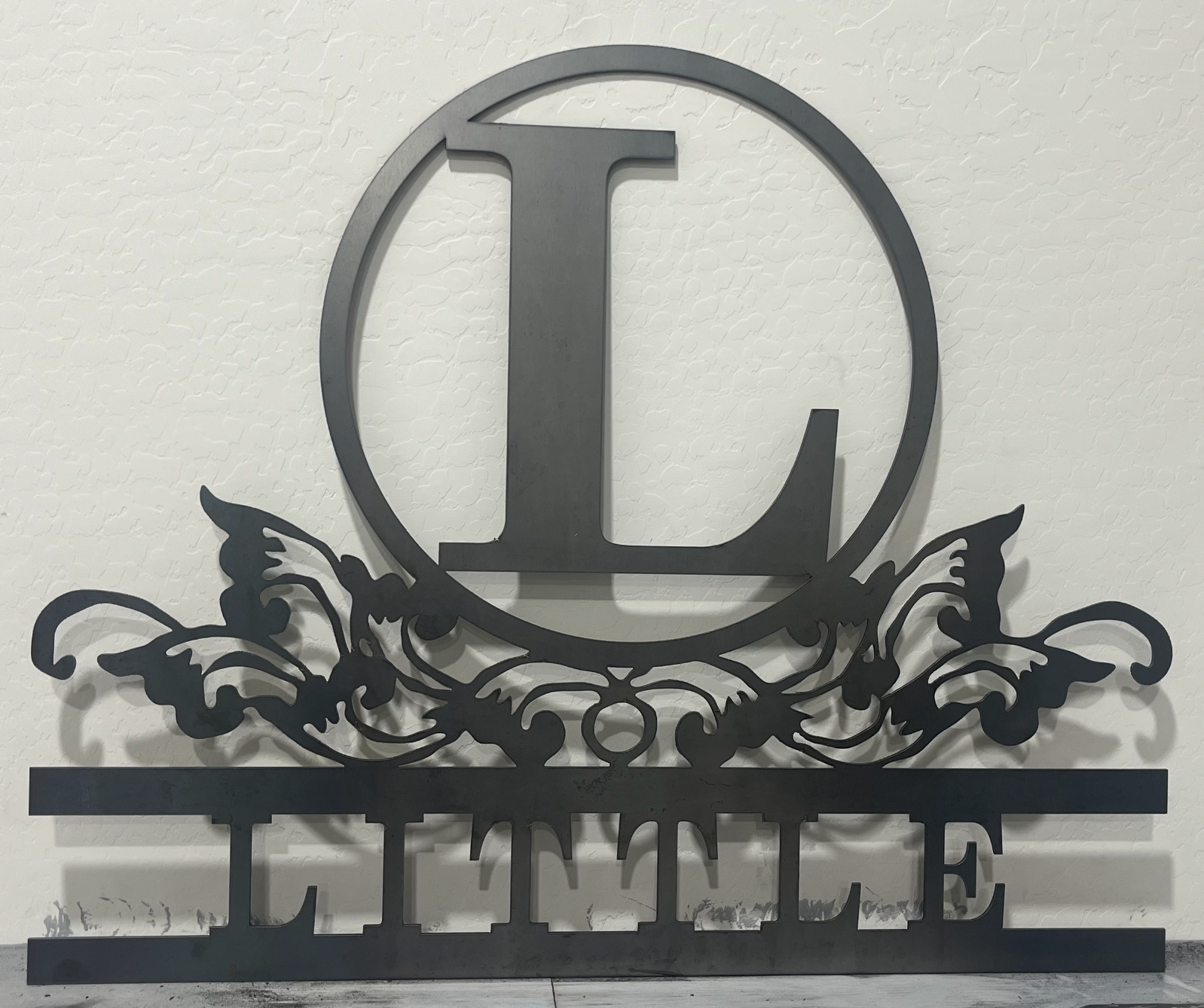 Custom Letner family monogram metal sign with scrollwork