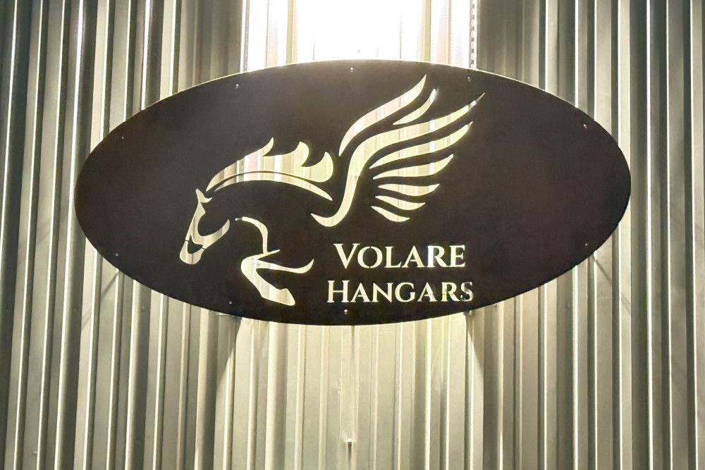 Custom backlit metal storefront signage