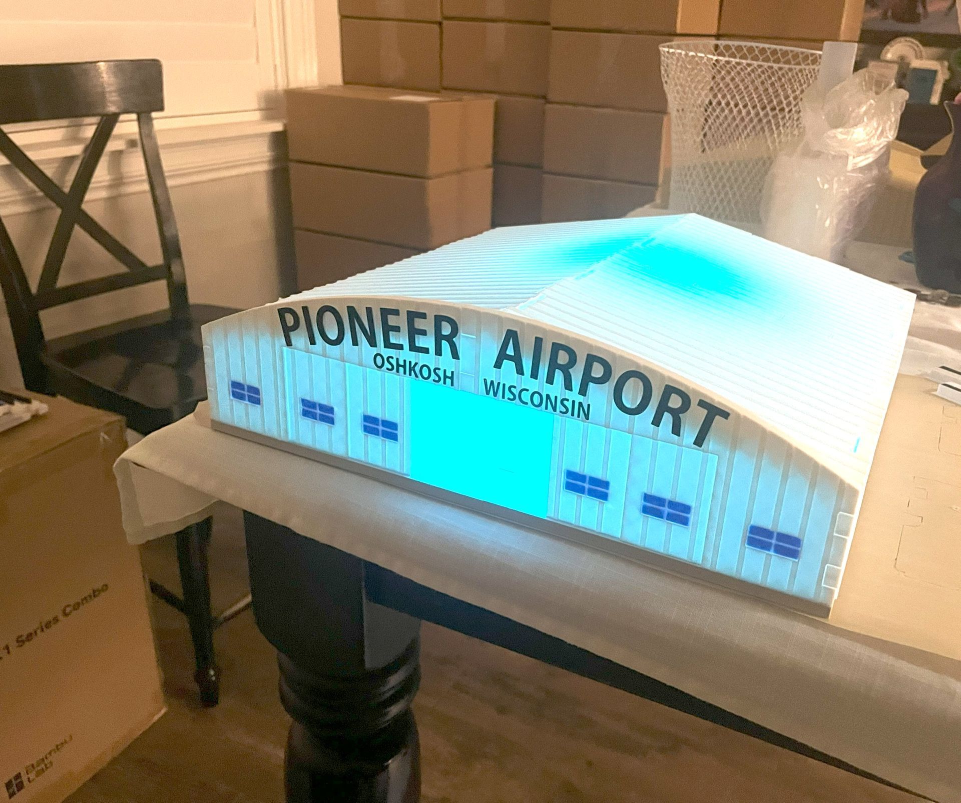 Illuminated Pioneer Airport hangar scale model