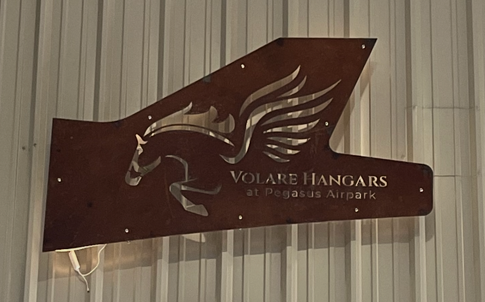 Volare Hangars at Pegasus Airpark illuminated sign